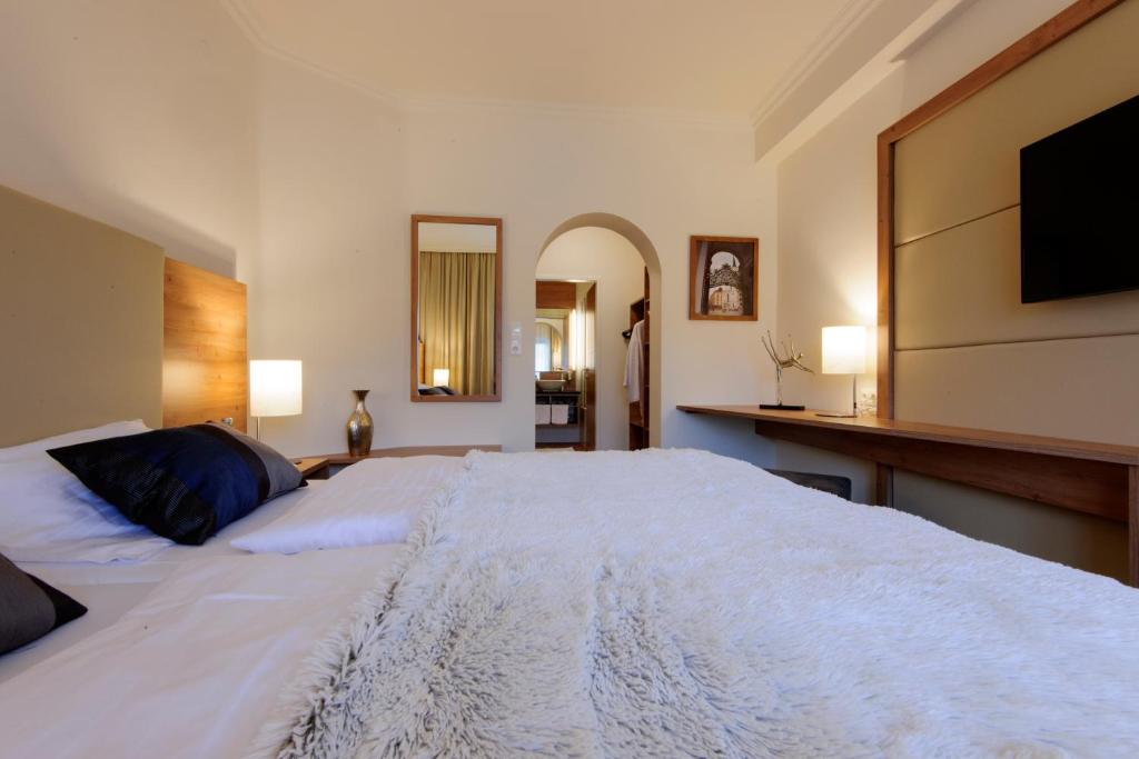 Postel nebo postele na pokoji v ubytování Seminarhotel Lengbachhof GmbH