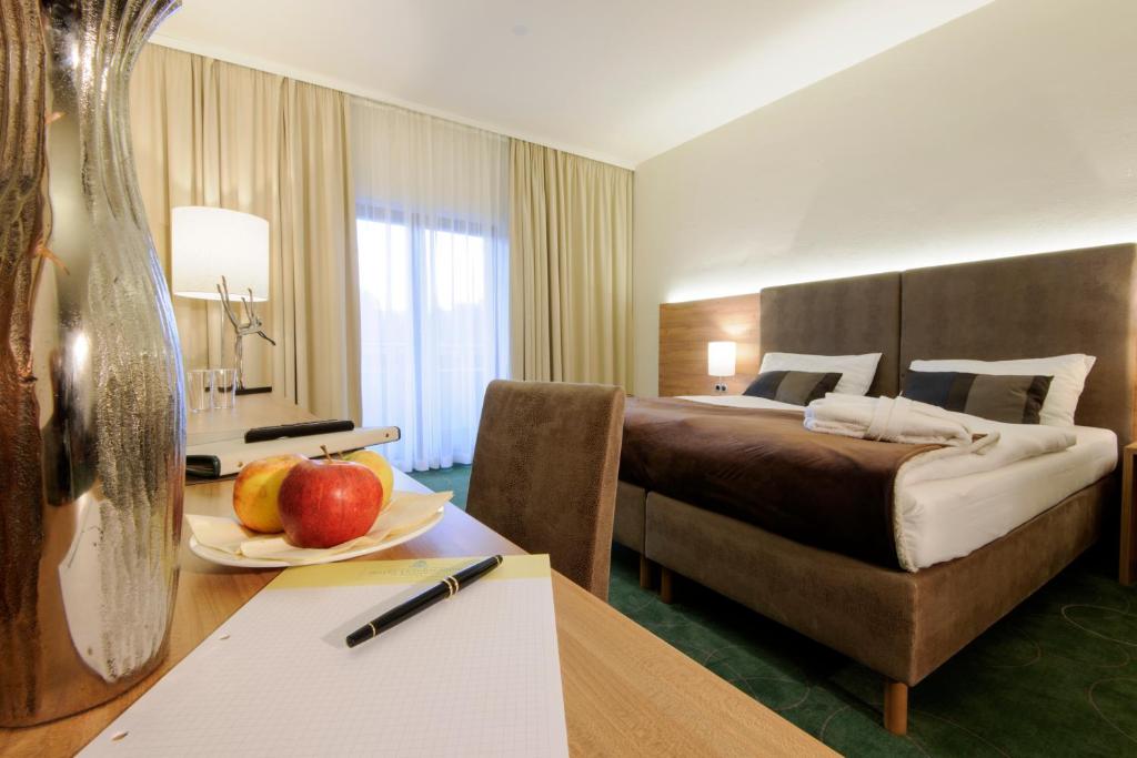 Postel nebo postele na pokoji v ubytování Seminarhotel Lengbachhof GmbH
