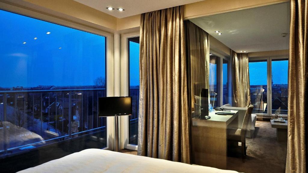 Postel nebo postele na pokoji v ubytování Thomas Hotel Spa & Lifestyle