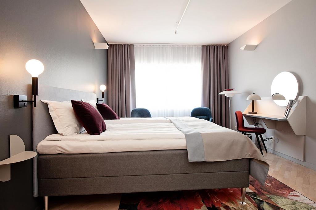 Postel nebo postele na pokoji v ubytování Elite Park Hotel