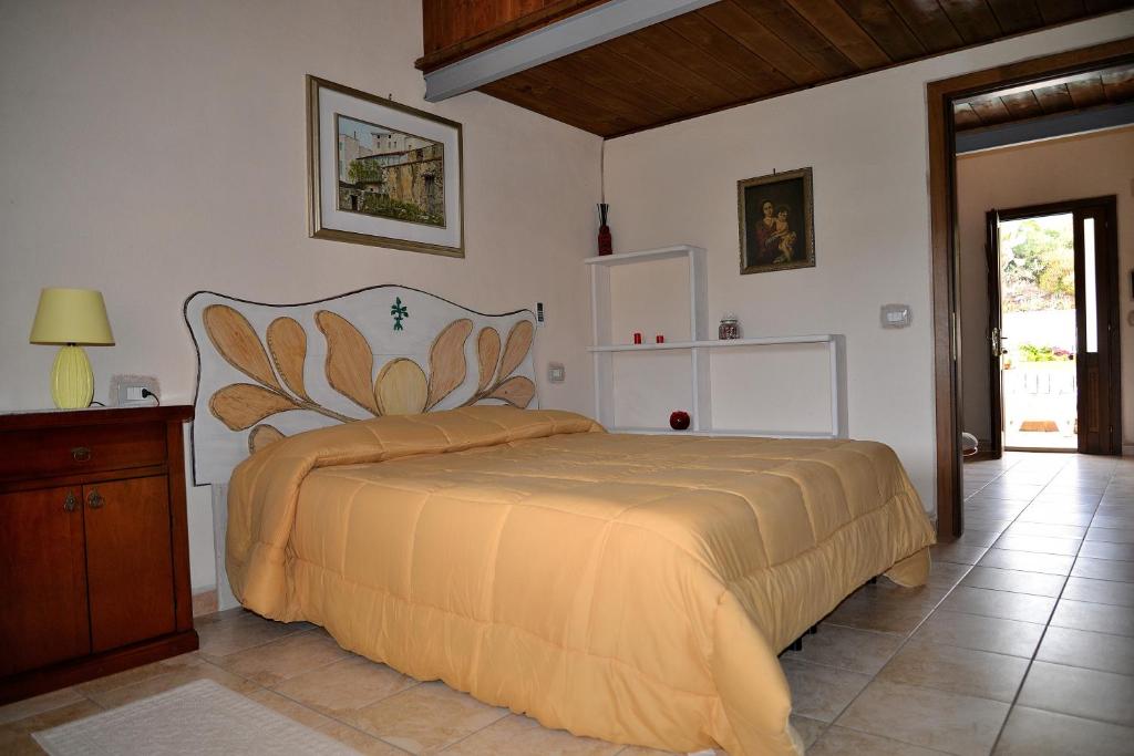 Postel nebo postele na pokoji v ubytování Hotel Valle del Cedrino