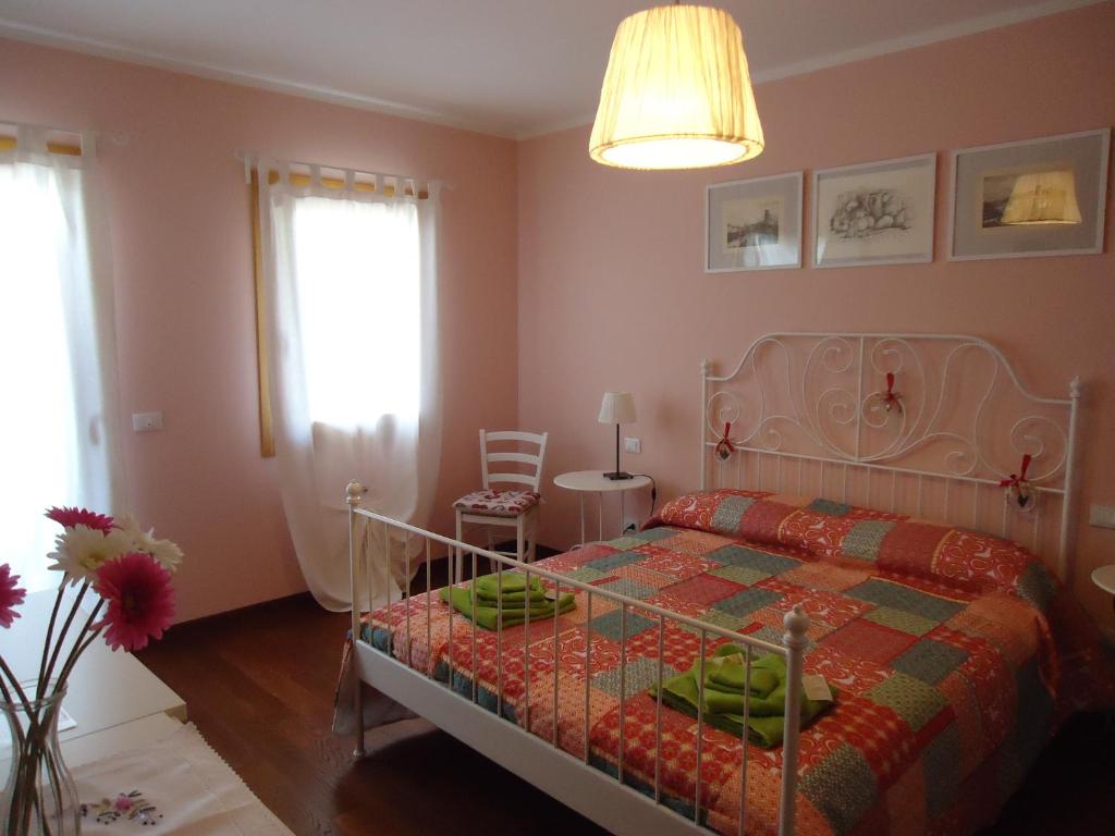 Postel nebo postele na pokoji v ubytování Re Leone Bed and Breakfast