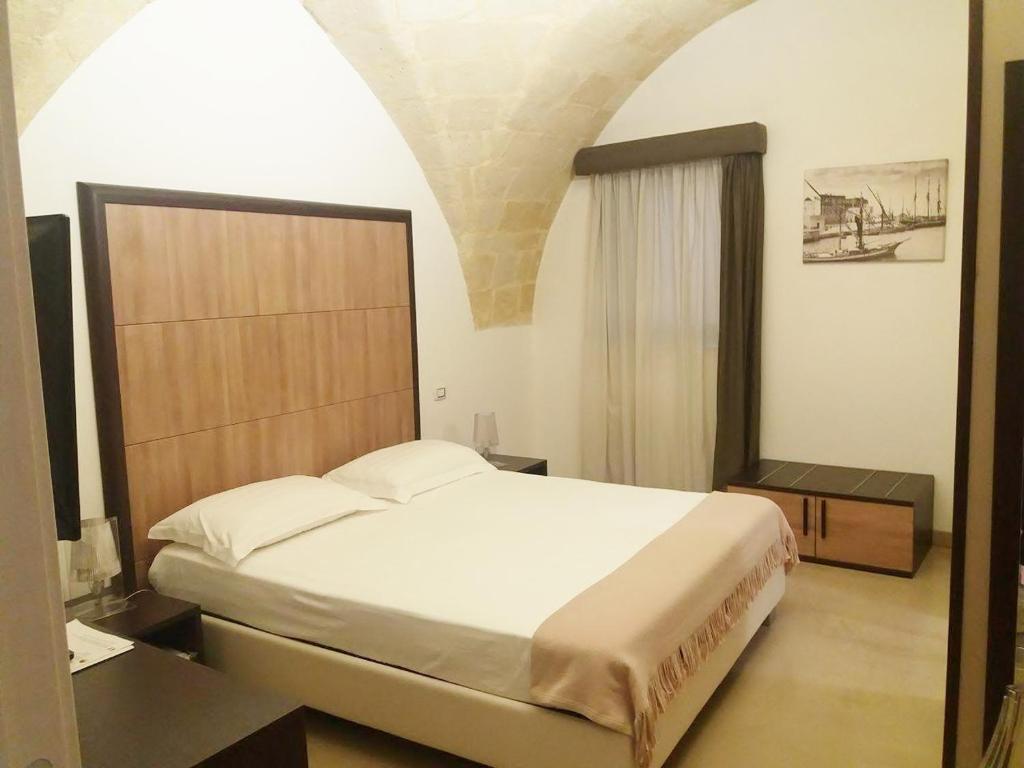 Postel nebo postele na pokoji v ubytování Albergo Del Sole