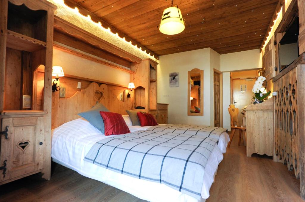 Postel nebo postele na pokoji v ubytování Hotel L'Equipe