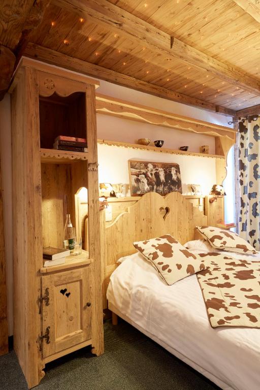 Postel nebo postele na pokoji v ubytování Hotel L'Equipe