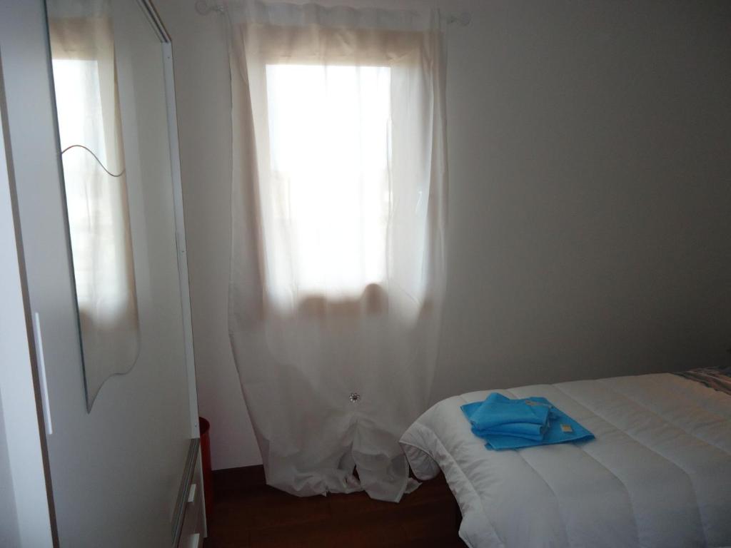 Postel nebo postele na pokoji v ubytování Re Leone Bed and Breakfast