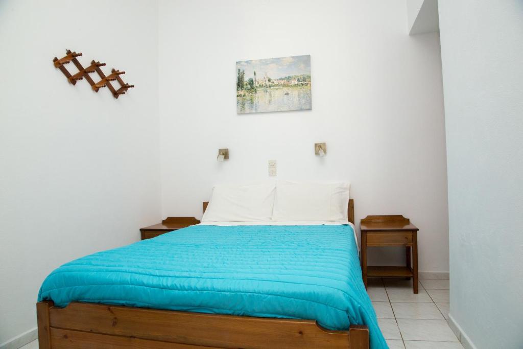 A bed or beds in a room at Perigiali