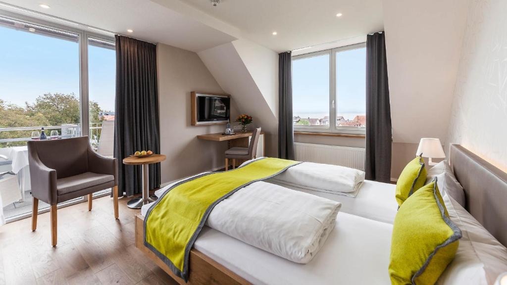 Postel nebo postele na pokoji v ubytování Hotel Restaurant Hansjakob