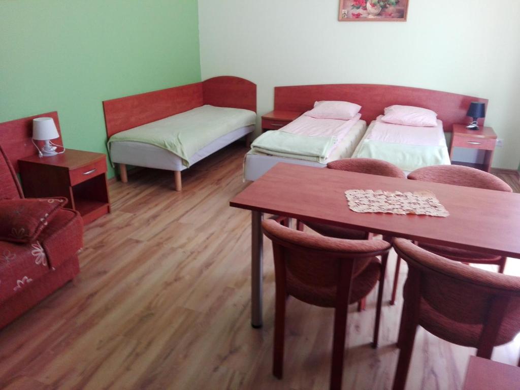 Postel nebo postele na pokoji v ubytování Pokoje Gościnne u Oli