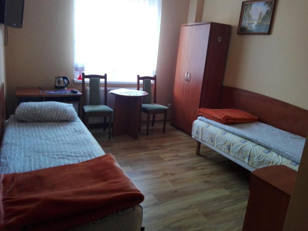 Postel nebo postele na pokoji v ubytování Pokoje Gościnne u Oli