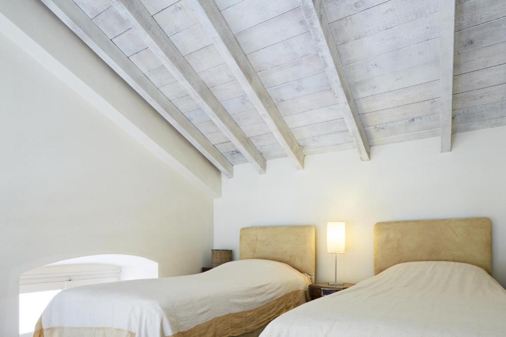Postel nebo postele na pokoji v ubytování Guesthouse Lila