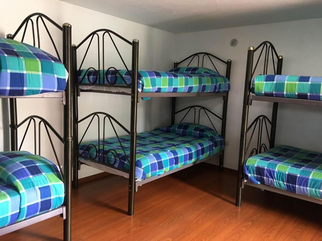 Postel nebo postele na pokoji v ubytování Hosteria San Carlos Tababela