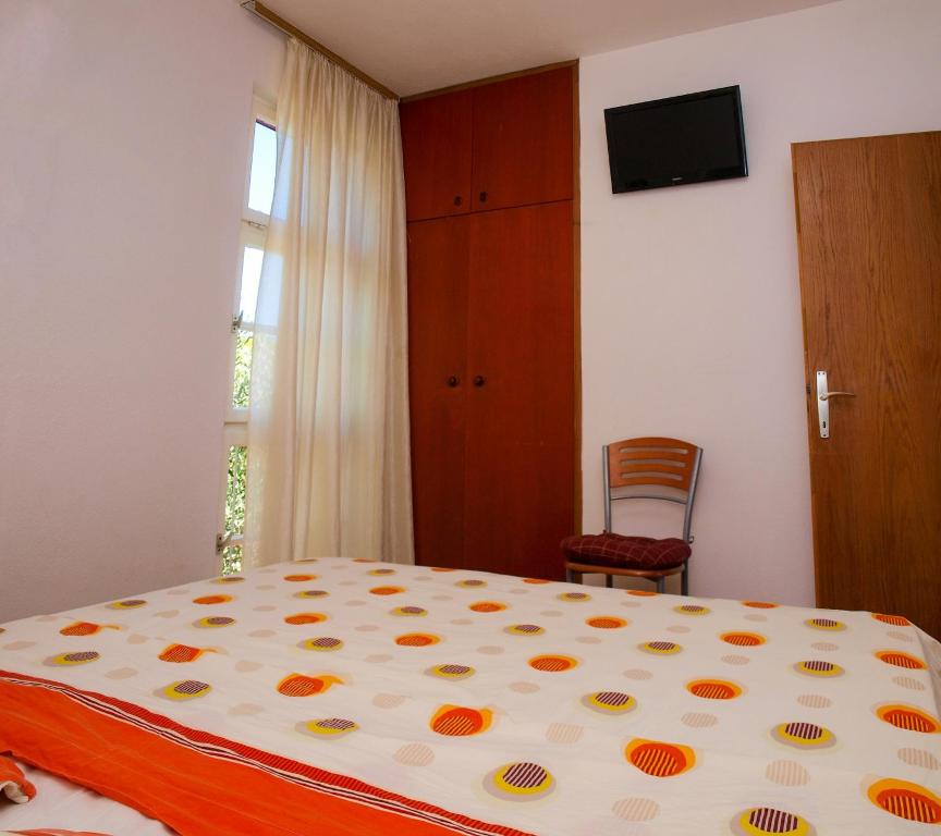 Postel nebo postele na pokoji v ubytování Apartment Petricic