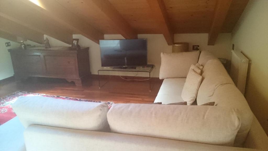 TV a/nebo společenská místnost v ubytování Casa dei Mulini