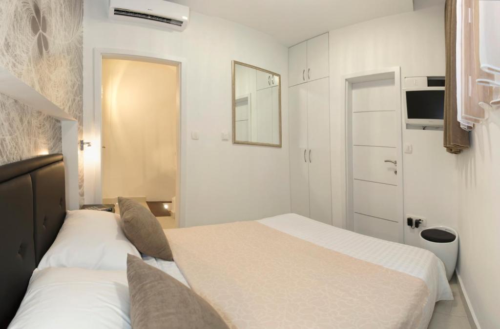 Postel nebo postele na pokoji v ubytování Apartment & Room Split Lea