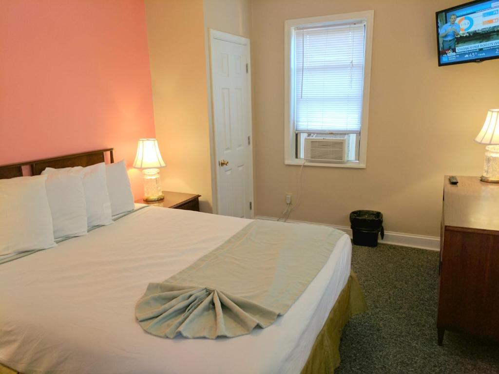 Postel nebo postele na pokoji v ubytování Key West Hotel