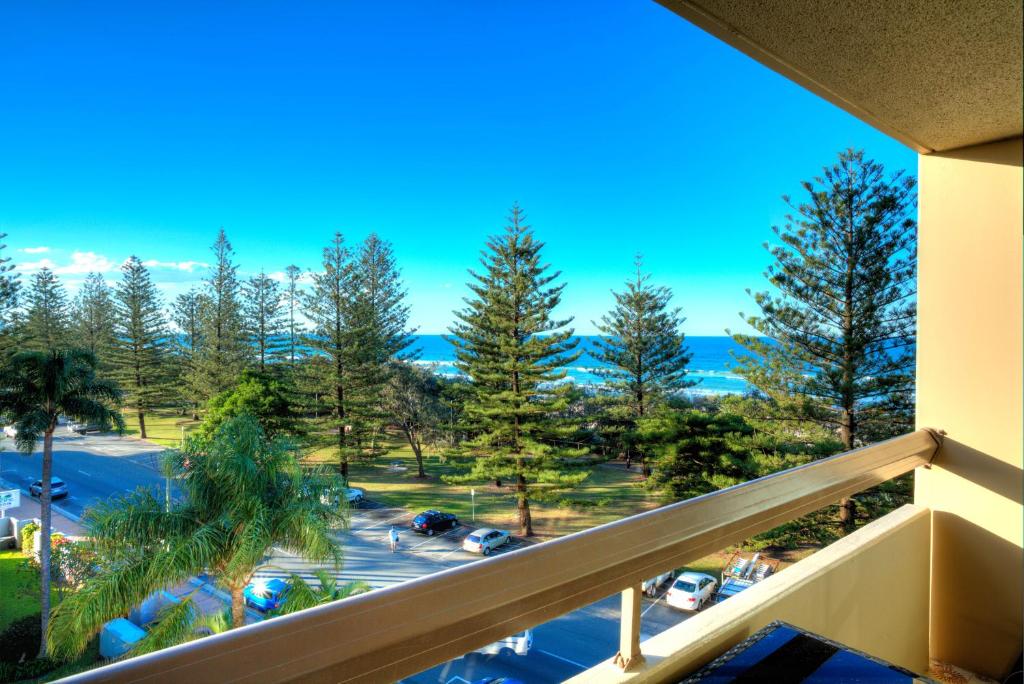 a view from a balcony overlooking a lake at Oceania on Burleigh Beach in Gold Coast