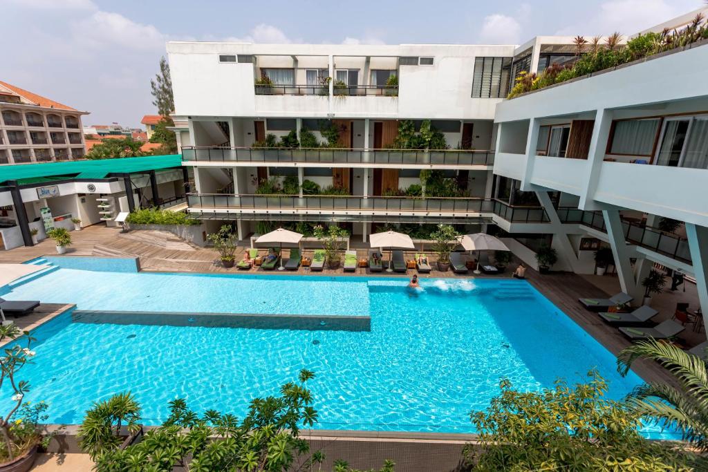 an overhead view of a swimming pool in a building at Somadevi Residence in Siem Reap