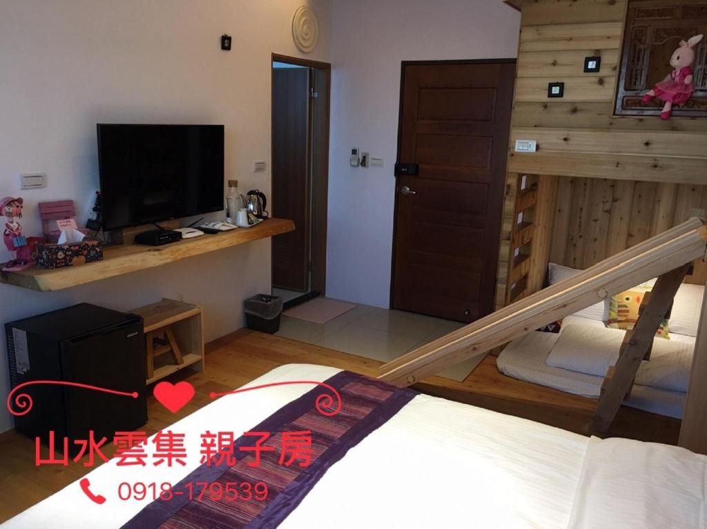 Postel nebo postele na pokoji v ubytování Shang Shui Yun Ji B&B