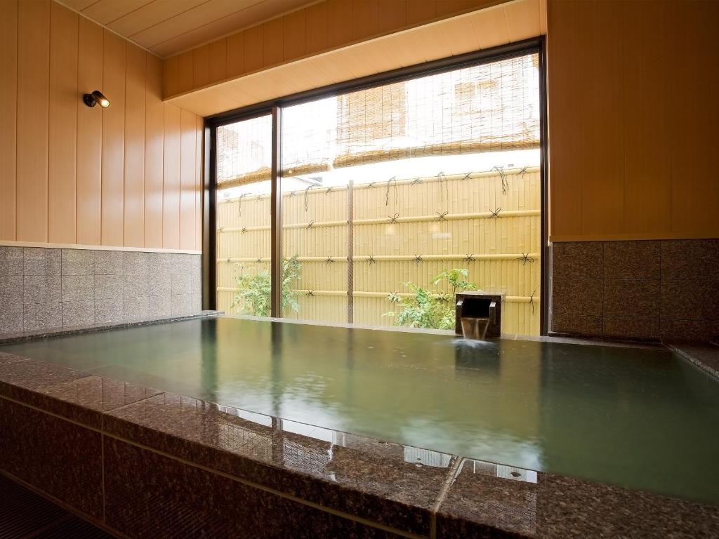 Bazén v ubytování Kotohira Riverside Hotel nebo v jeho okolí