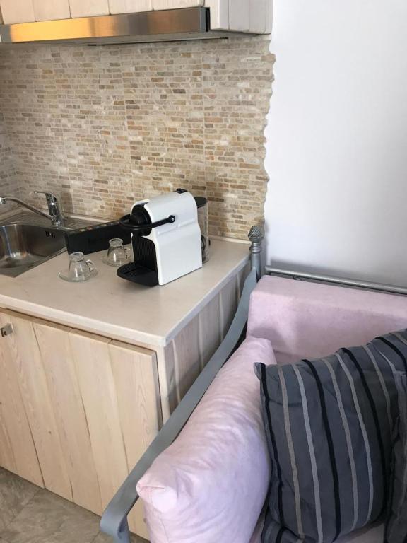 Kuchyňa alebo kuchynka v ubytovaní Starlight Luxury Studios
