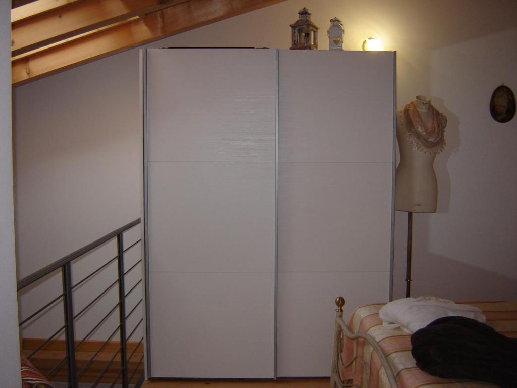 Postel nebo postele na pokoji v ubytování Casa Del Sole