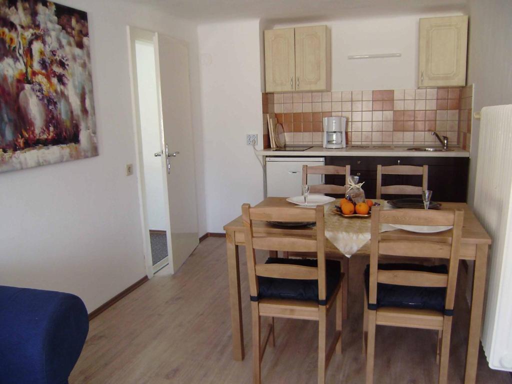 Kuchyňa alebo kuchynka v ubytovaní Cafe Vielharmonie Apart-Pension