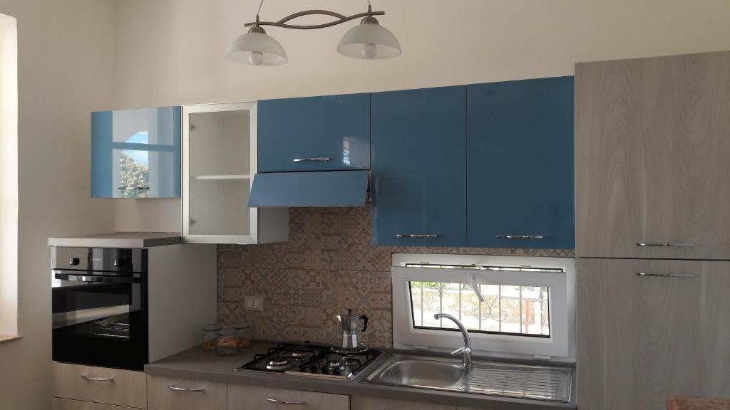 Kuchyňa alebo kuchynka v ubytovaní Casa Vacanze Reginotte