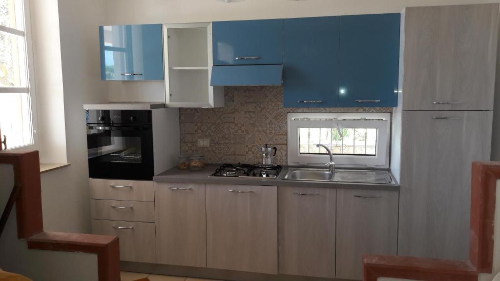 Kuchyňa alebo kuchynka v ubytovaní Casa Vacanze Reginotte