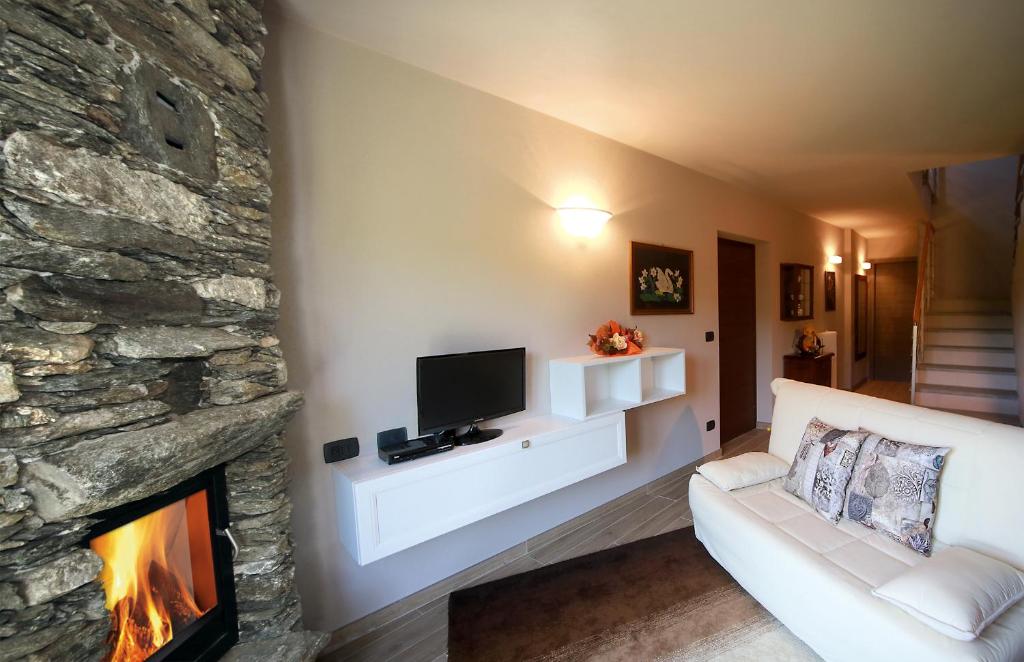 Televízia a/alebo spoločenská miestnosť v ubytovaní CHALETS MONGIOIE Pra di Roburent