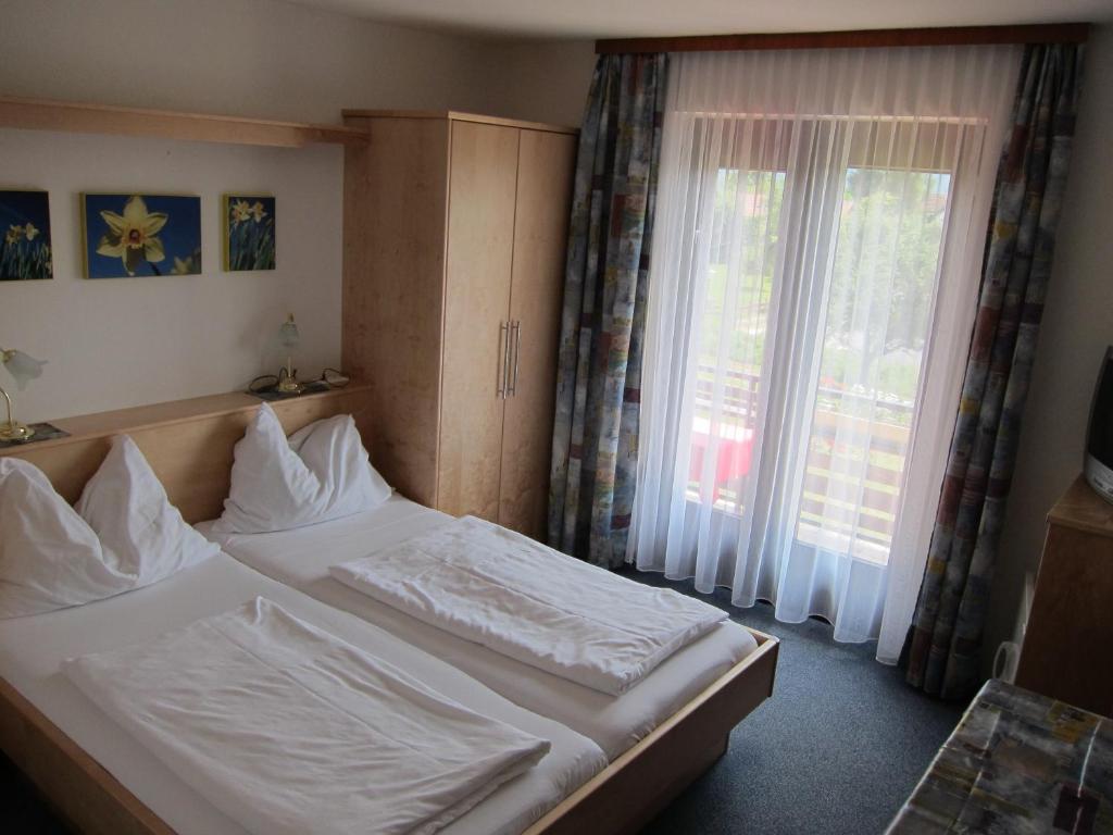 Postel nebo postele na pokoji v ubytování Haus Kaiser