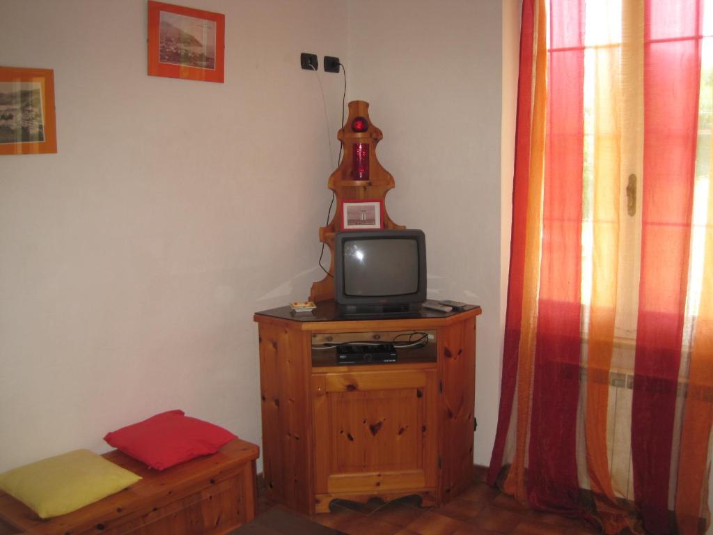 TV a/nebo společenská místnost v ubytování B&B Fattore