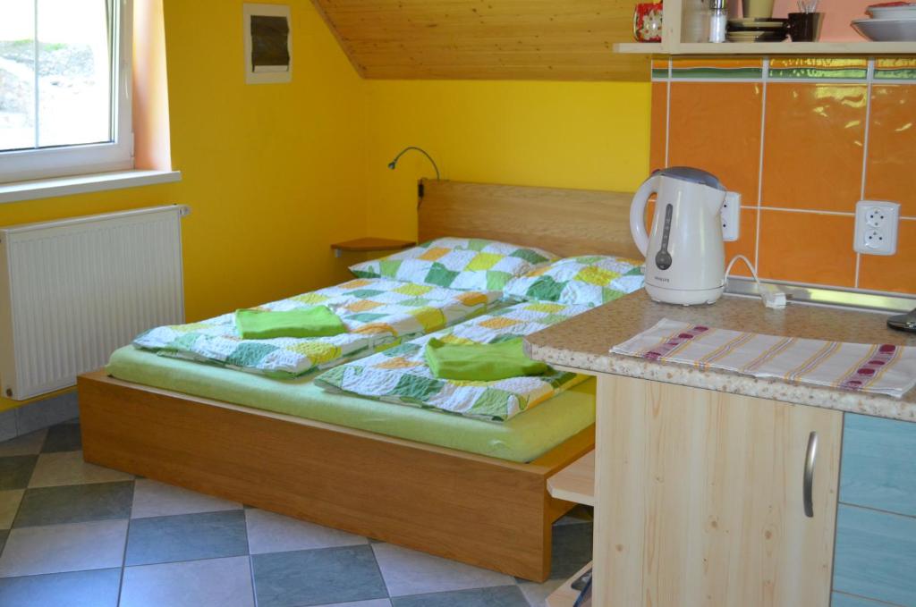 Postel nebo postele na pokoji v ubytování Chata Danuše