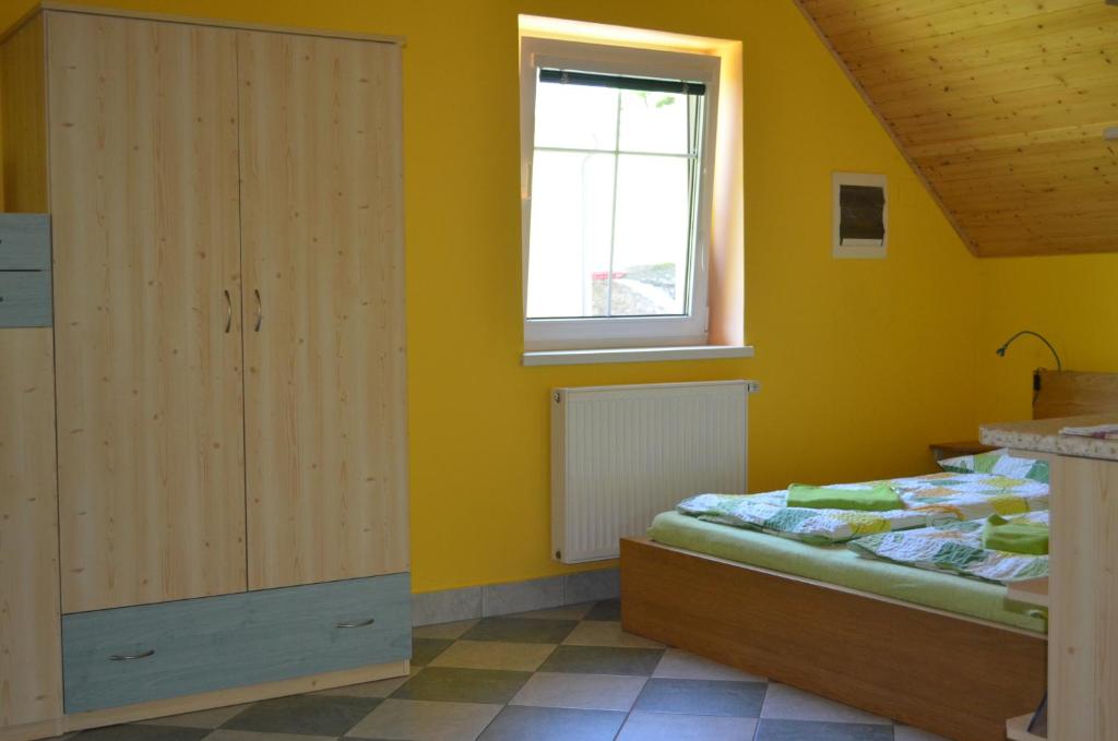 Postel nebo postele na pokoji v ubytování Chata Danuše
