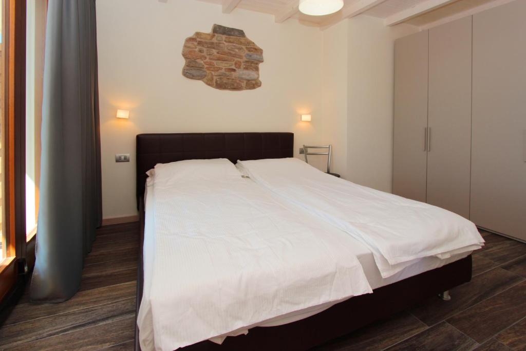 Postel nebo postele na pokoji v ubytování Al Terrazzo Apartments - Ruculì Hospitality
