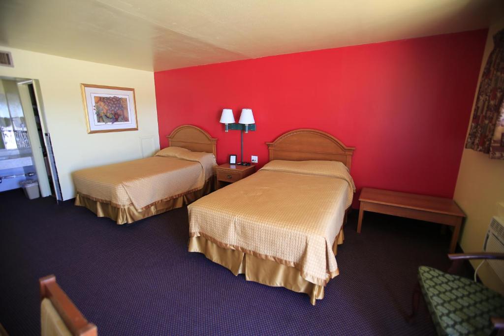 Postel nebo postele na pokoji v ubytování Shamrock Country Inn