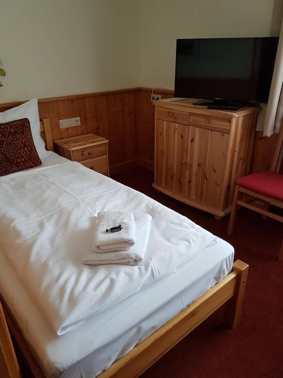 Postel nebo postele na pokoji v ubytování Hotel Tauplitzerhof