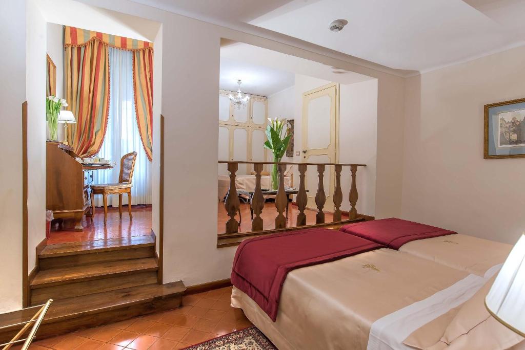 Postel nebo postele na pokoji v ubytování Hotel Forum