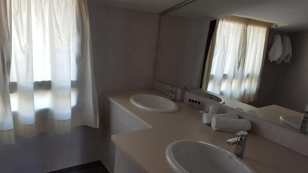Kúpeľňa v ubytovaní Hotel L'Escala Centre