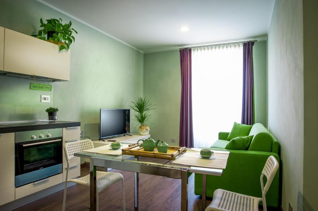 Kuchyň nebo kuchyňský kout v ubytování Arc en Ciel Appartments