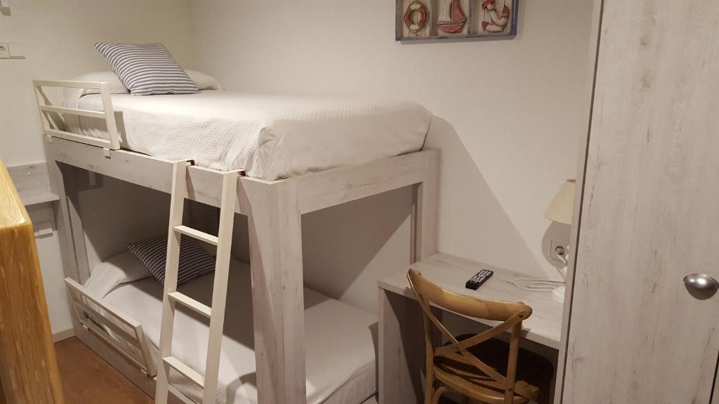 Posteľ alebo postele v izbe v ubytovaní Hotel L'Escala Centre