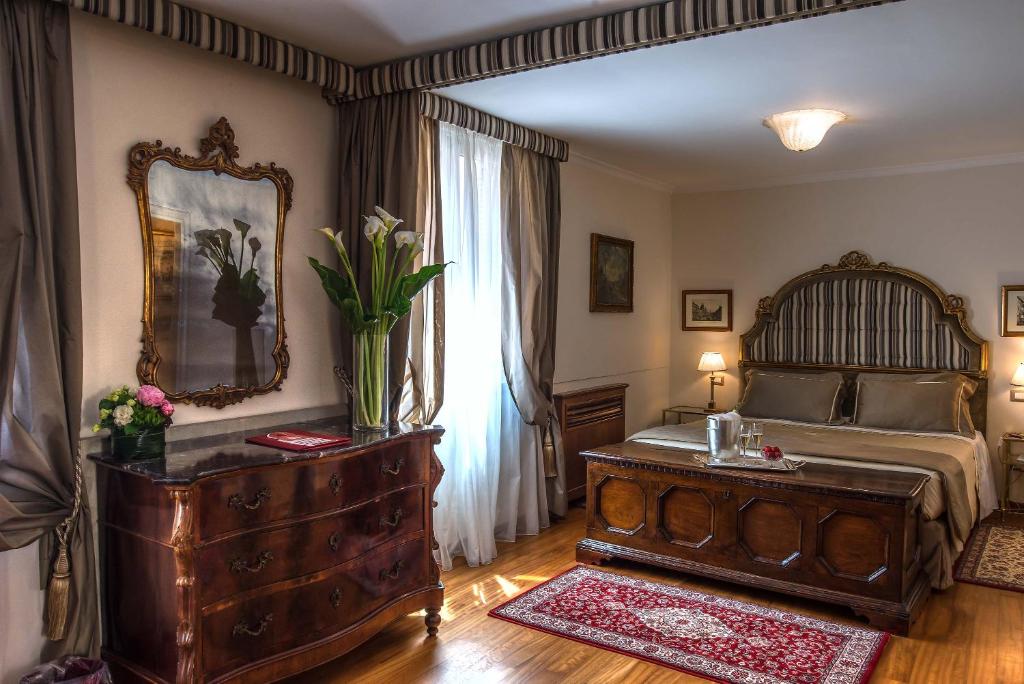 Postel nebo postele na pokoji v ubytování Hotel Forum