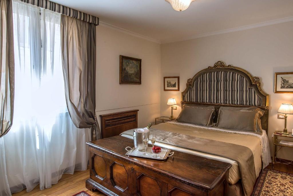 Postel nebo postele na pokoji v ubytování Hotel Forum