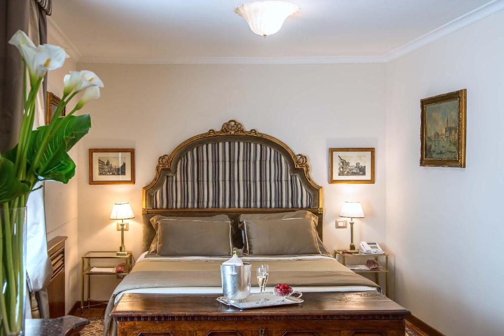 Postel nebo postele na pokoji v ubytování Hotel Forum