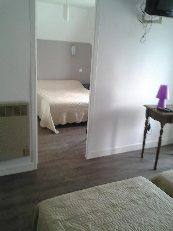 Postel nebo postele na pokoji v ubytování Le Ranfort Chambres d'Hôtes