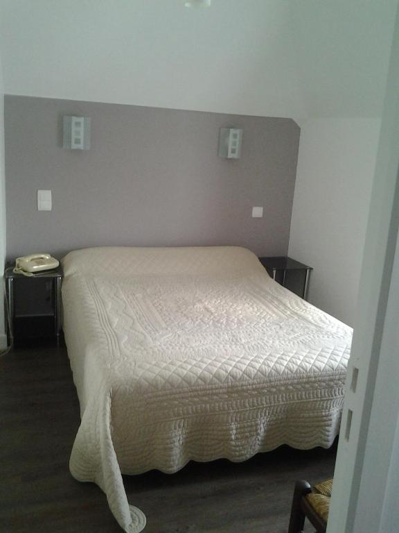 Postel nebo postele na pokoji v ubytování Le Ranfort Chambres d'Hôtes
