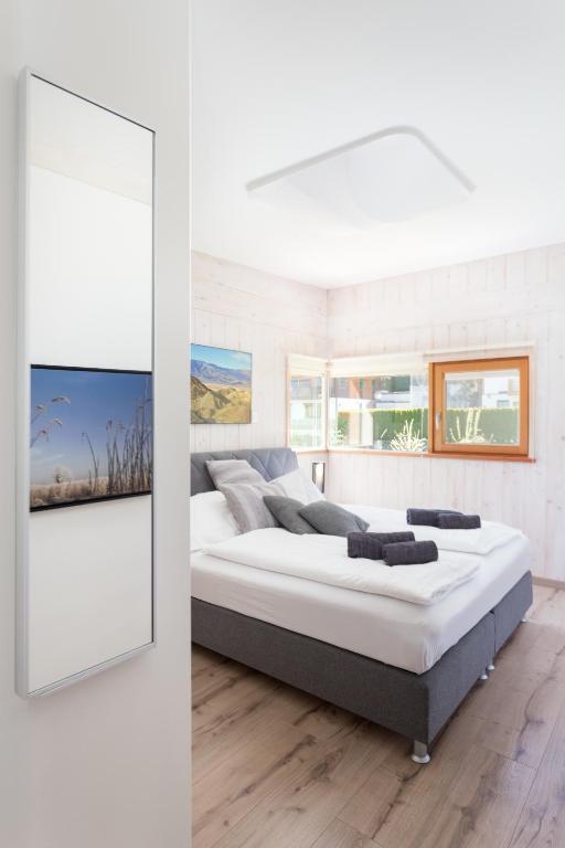 Postel nebo postele na pokoji v ubytování Designferienhaus Altenmarkt Zauchensee