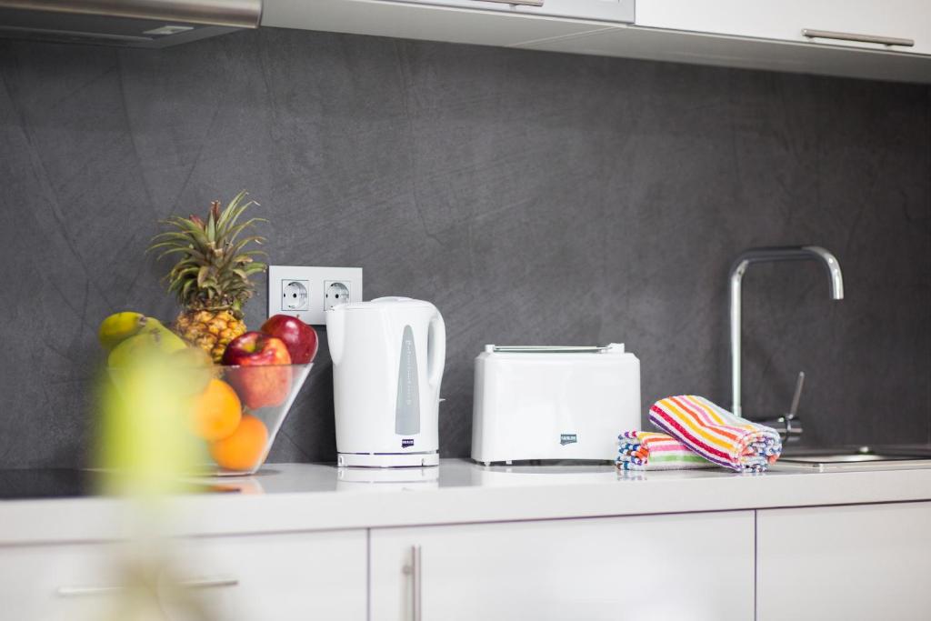 A kitchen or kitchenette at Valentina Beach