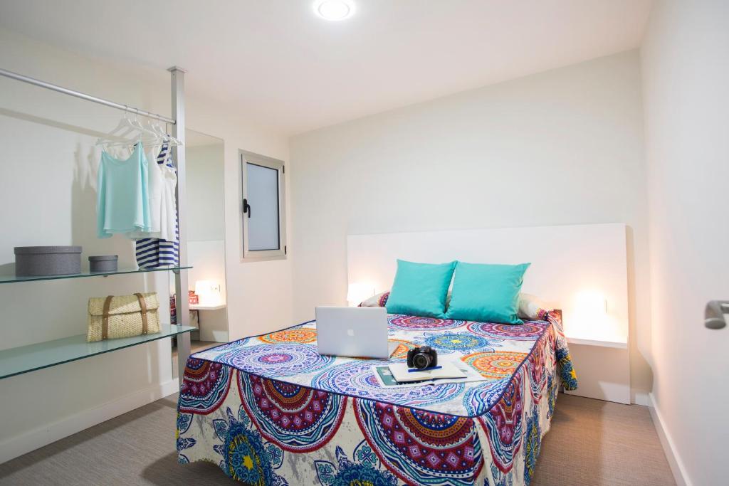 A bed or beds in a room at Valentina Beach