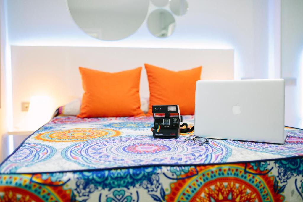 A bed or beds in a room at Valentina Beach